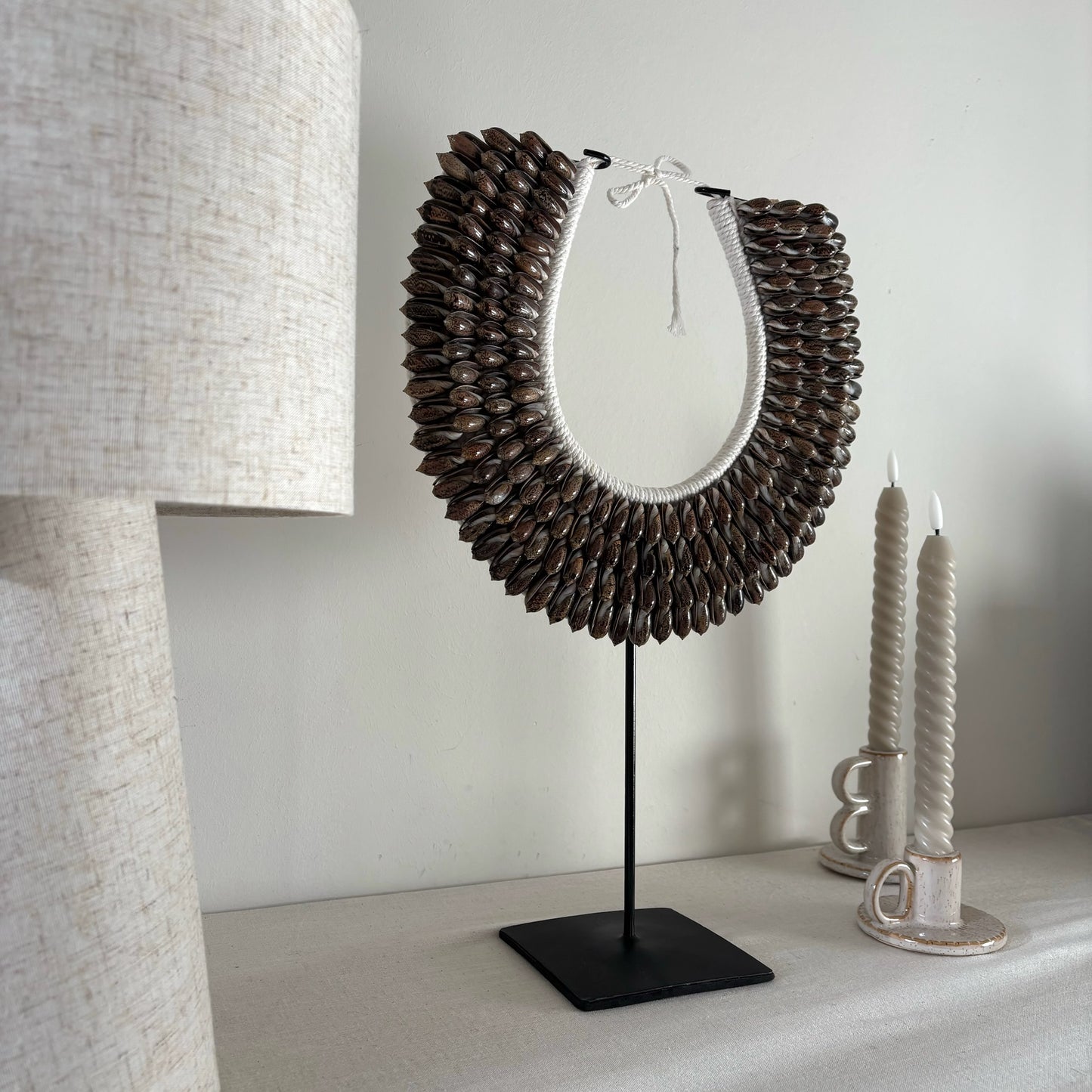 Schelpenketting op Standaard Isla