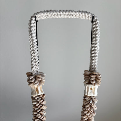 Schelpenketting op Standaard Faya