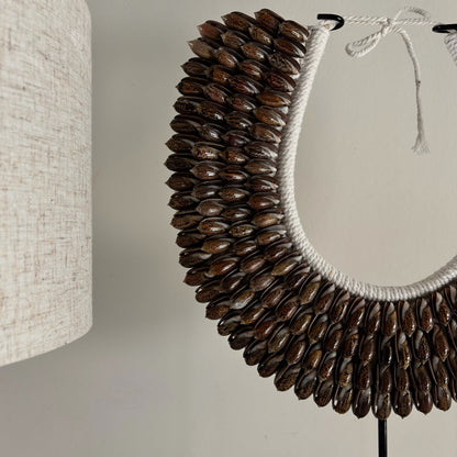 Schelpenketting op Standaard Isla